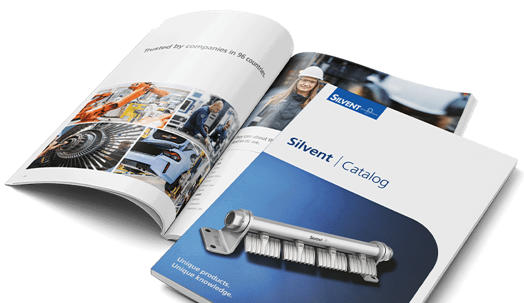 Silvent's catalog showing both the front cover and an open spread from the introduction section.