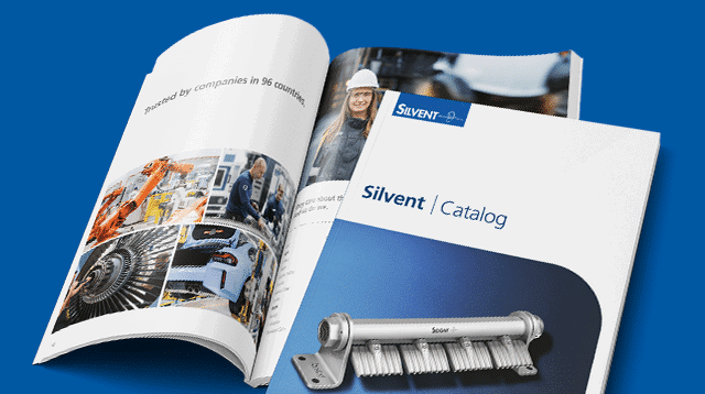 Silvent's catalog showing both the front cover and an open spread from the introduction section.